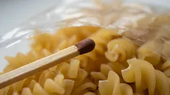 I always put a match in the pasta. This trick has helped me out more than once.